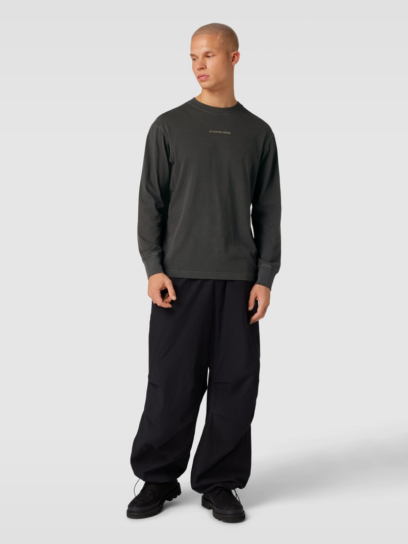 Sweatshirt in unifarbenem Design mit Label-Print in schwarz