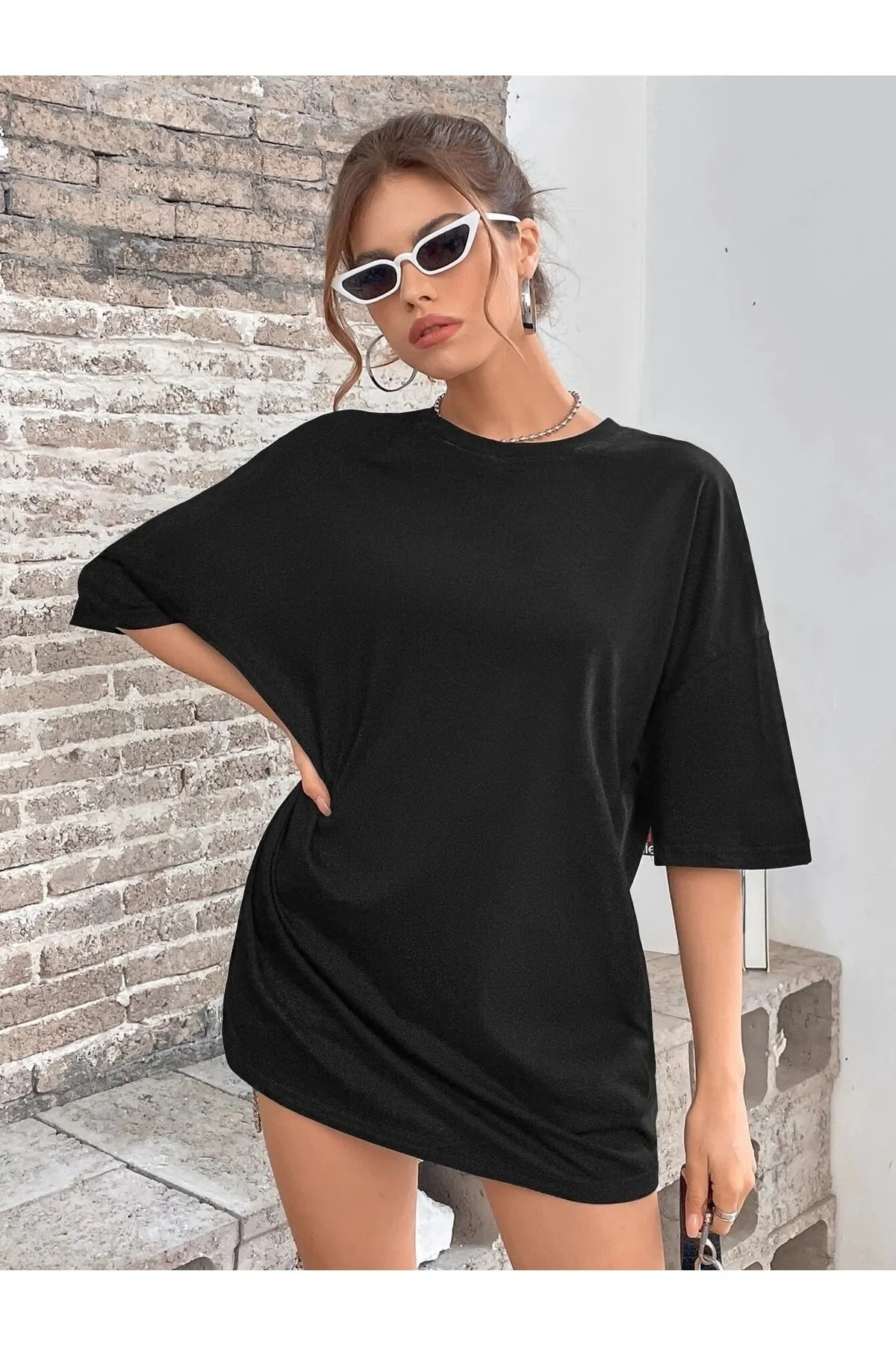 Know  Schwarzes Oversize-T-Shirt mit vertikalen Schmetterlingen für Damen