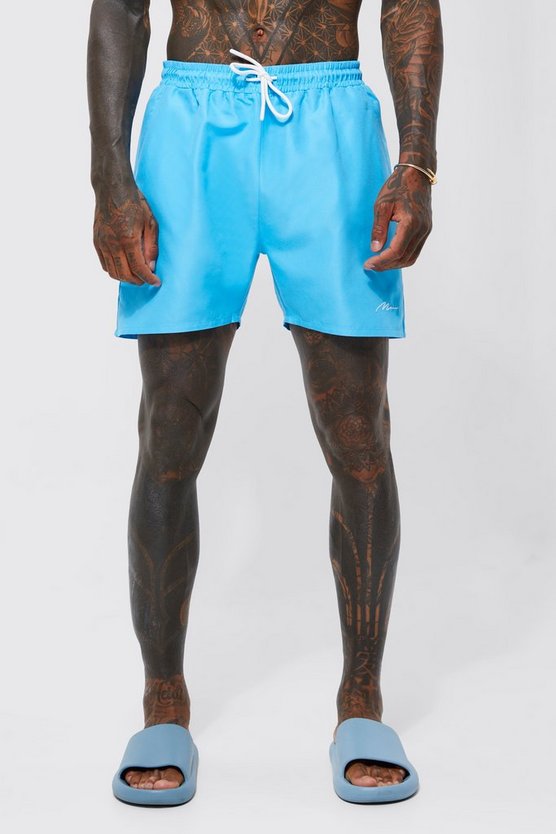 Man Signature mittellange Badehose