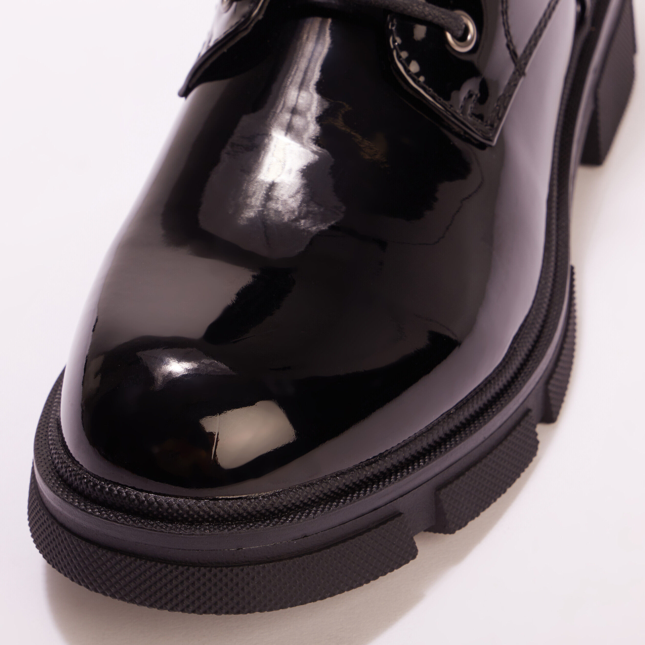 Bottines crantées zippées denim noir enduit femme | Cache Cache