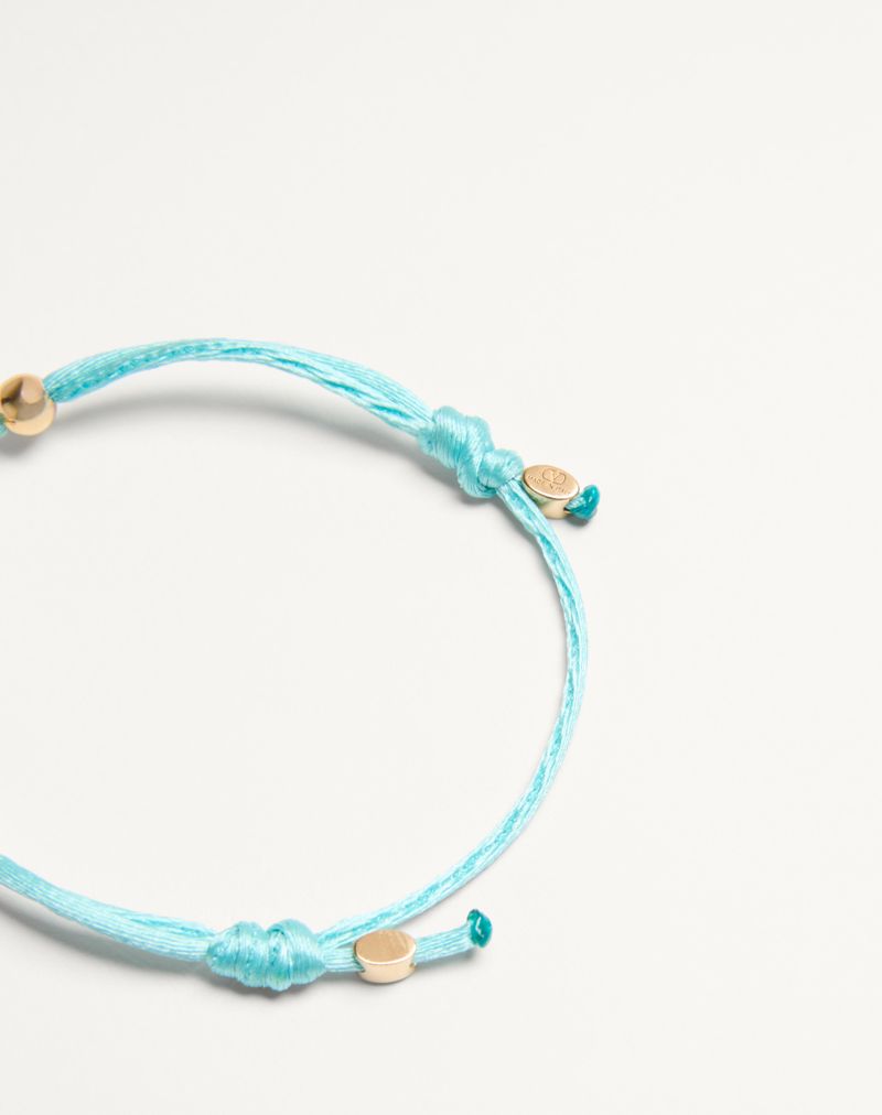 Pulseira Valentino com o logotipo V em algodão e cristais Swarovski®
