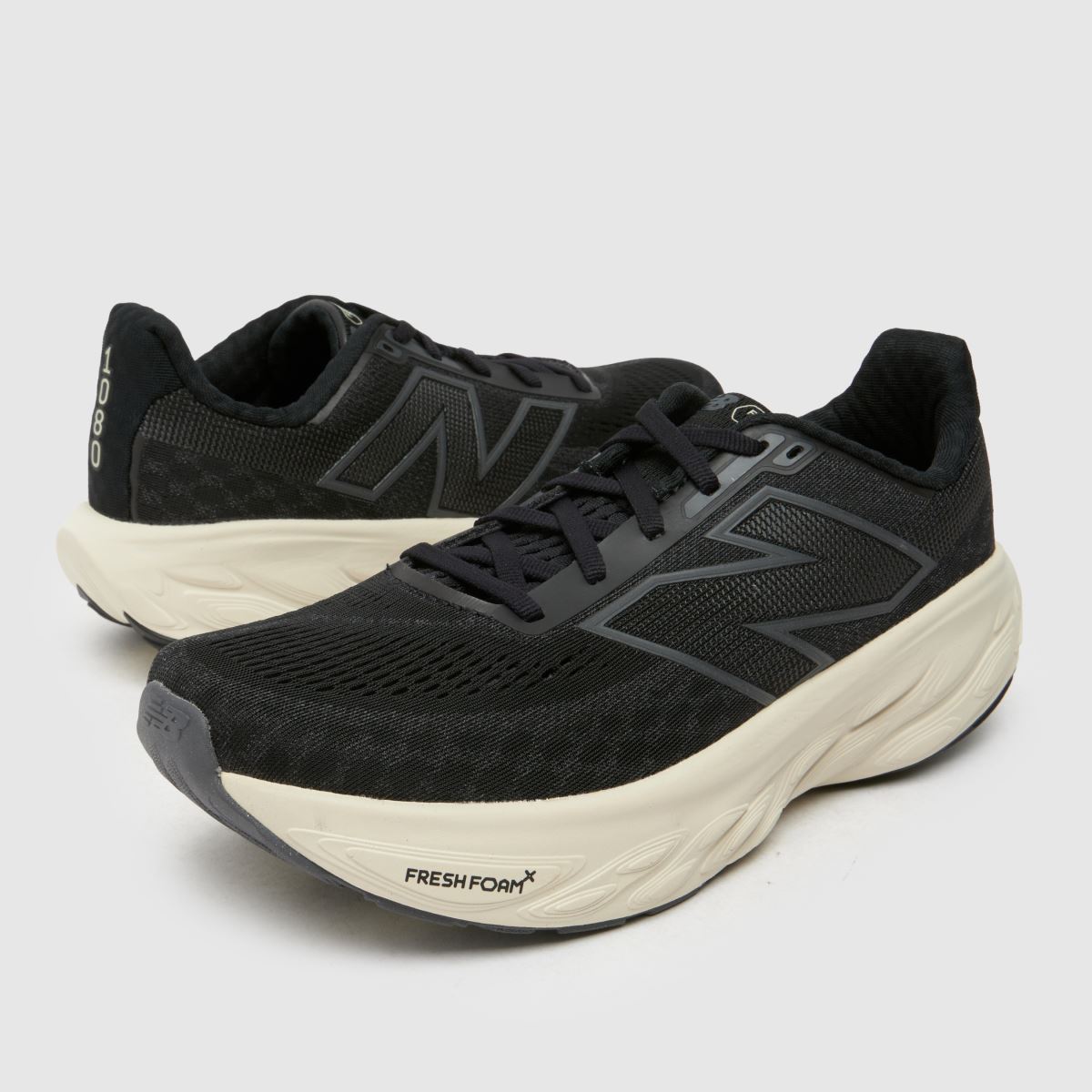 New Balance – Svarta träningsskor med färskt skummönster och 1080 v14-logotyp