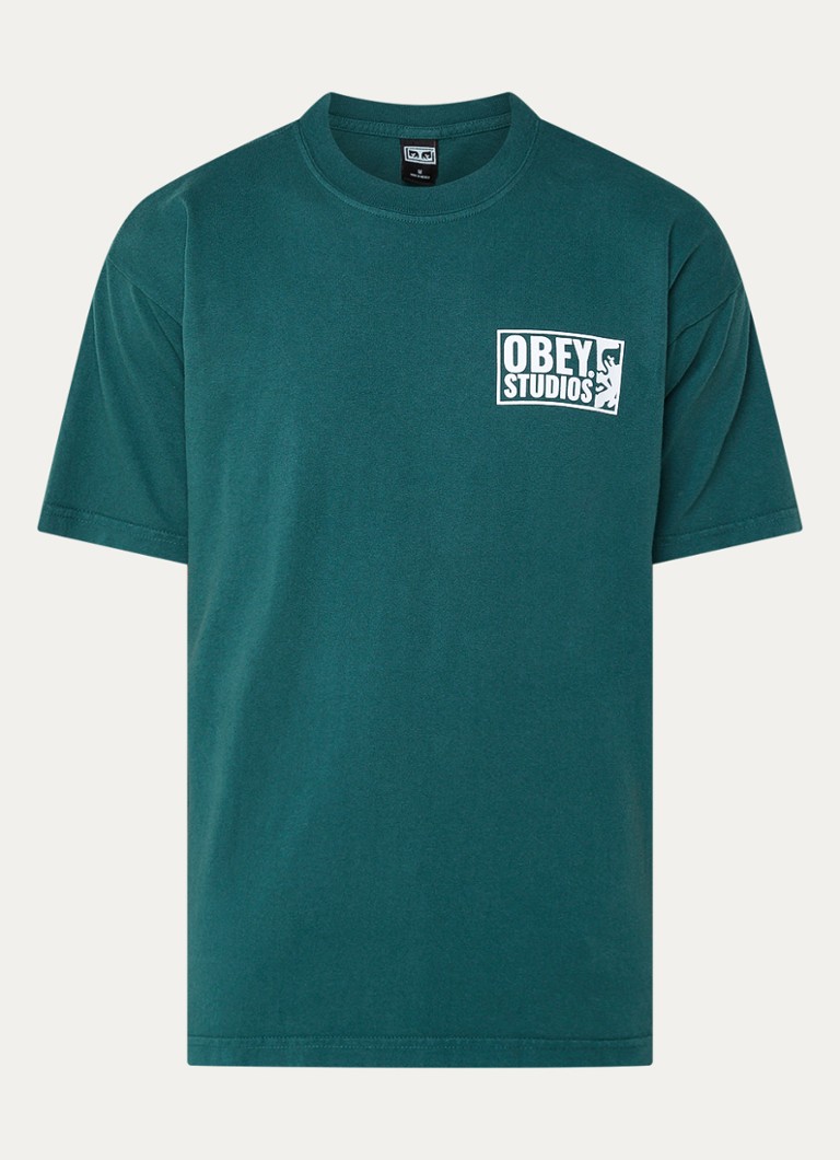 Tričko Obey Studios Icon s logem a potiskem na zádech