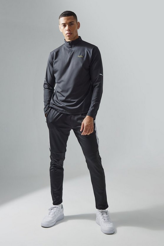 Man Active Performance Trainingsoberteil mit 1/4 Reißverschluss und Jogginghose