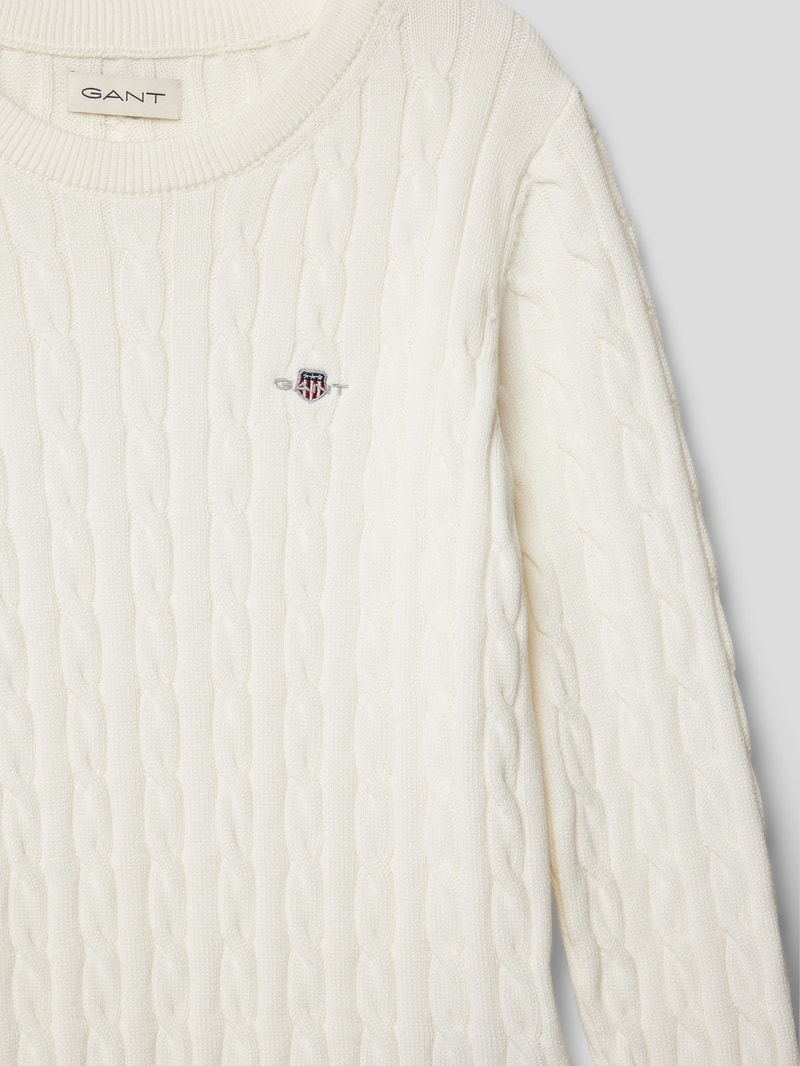 Strickpullover mit Zopfmuster Modell 'SHIELD' in offwhite
