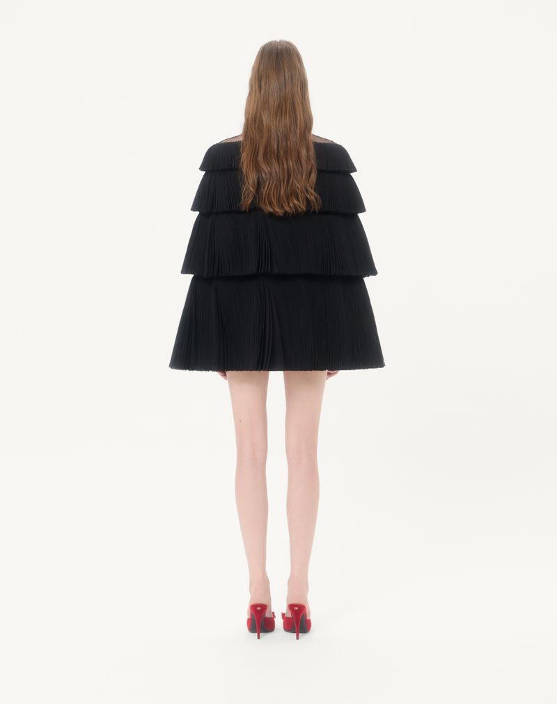 Capa de organza bordada