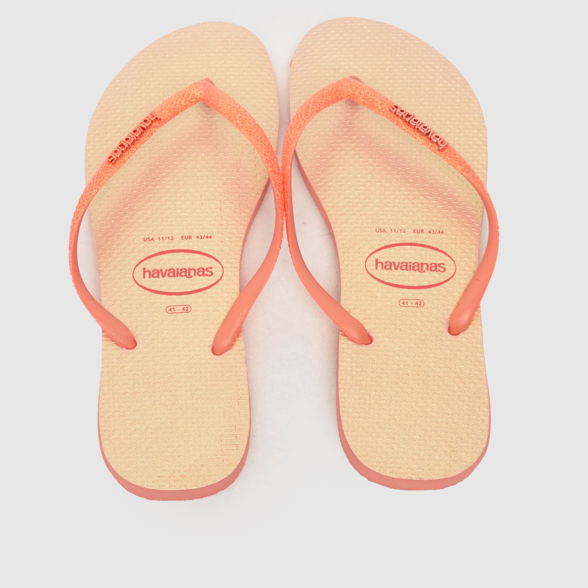 Havaianas – Persikafärgade smala glitter-sandaler med skimrande look