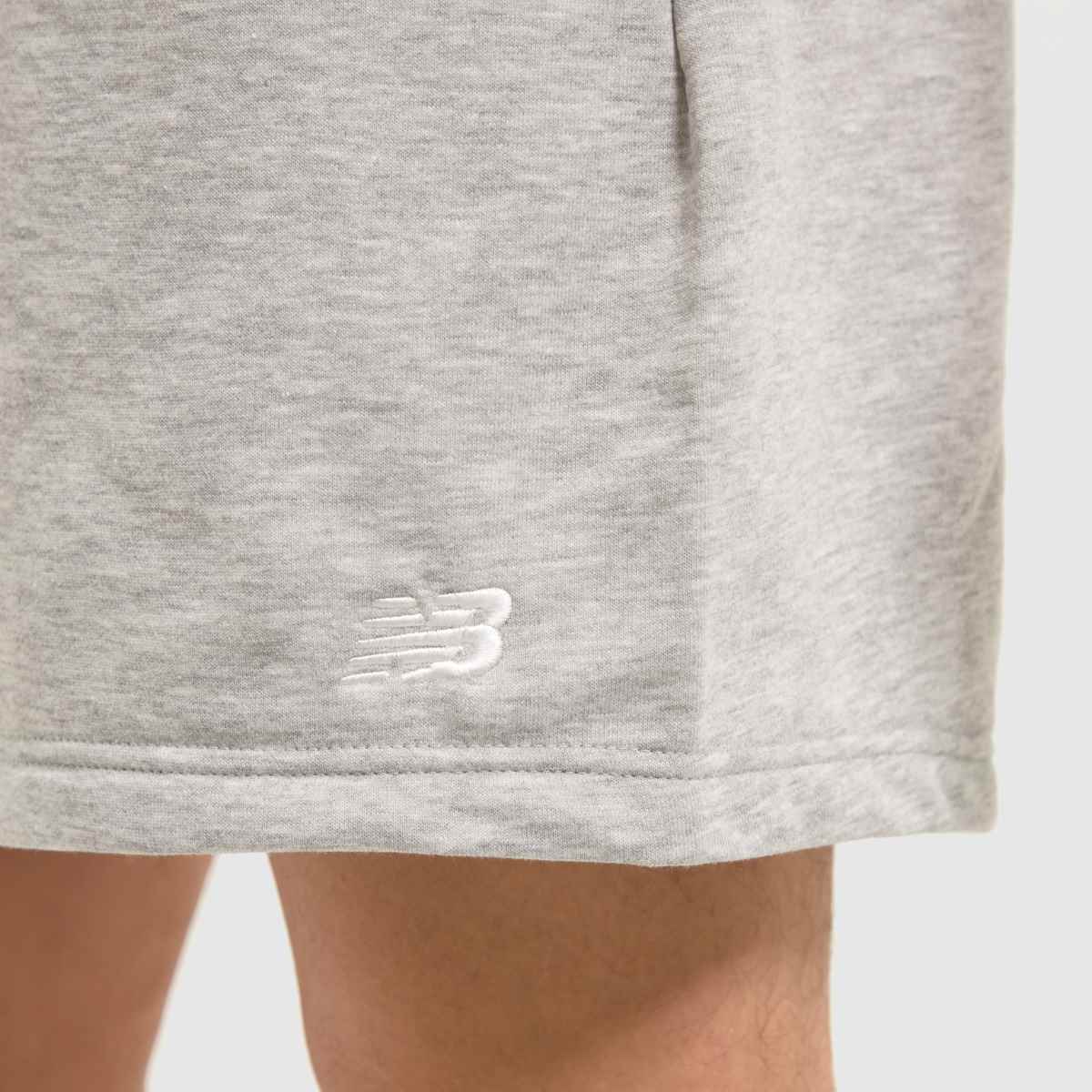 New Balance – Grå shorts i french terry-modell med 7 tums passform