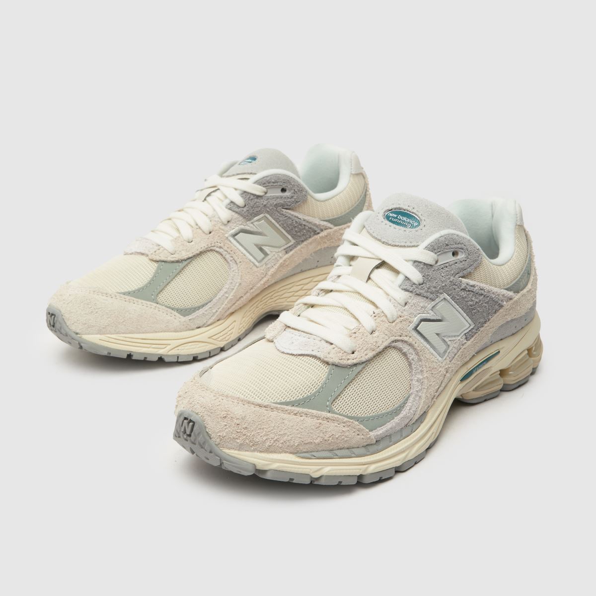 New Balance 2002 sportcipő törtfehér színben