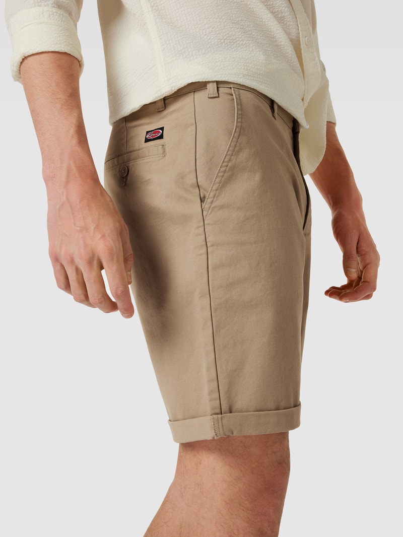 Bermudas mit Paspeltaschen in beige