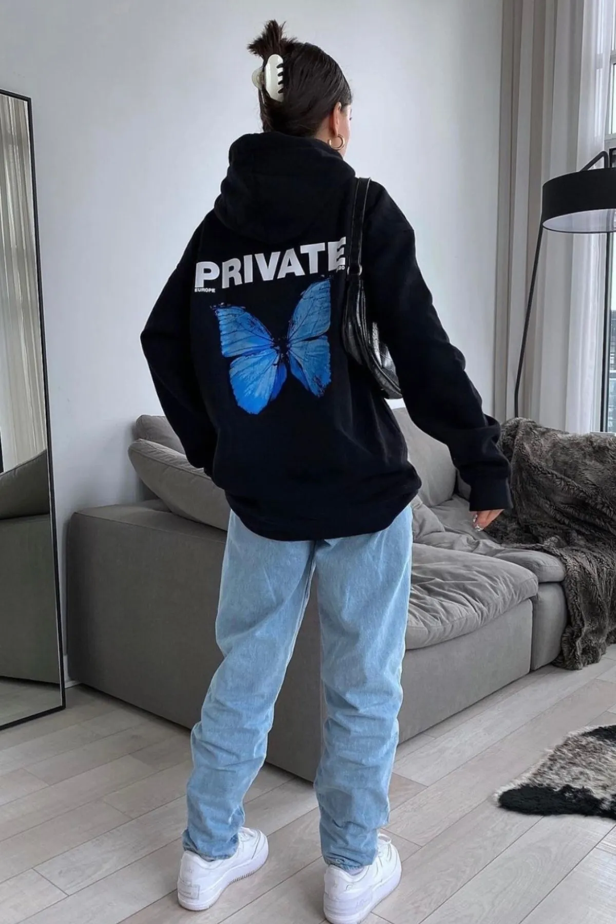 MODAGEN  Schwarzes, übergroßes Kapuzen-Sweatshirt mit Private-Back-Print für Damen