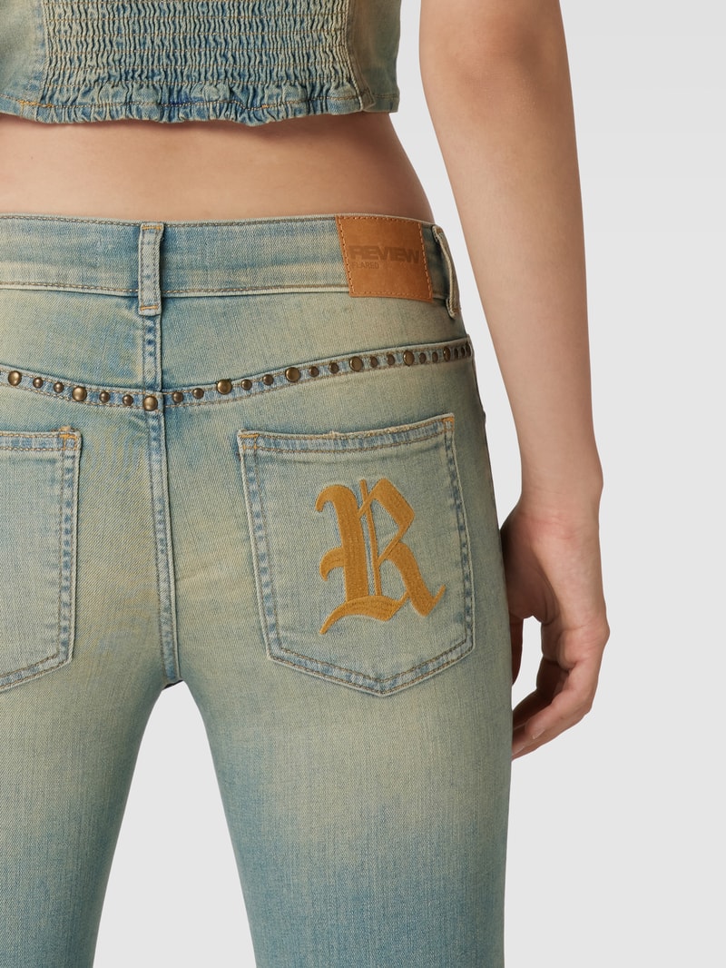 Bootcut Jeans mit Label-Applikation Modell 'FLARED GREENWASH' in petrol