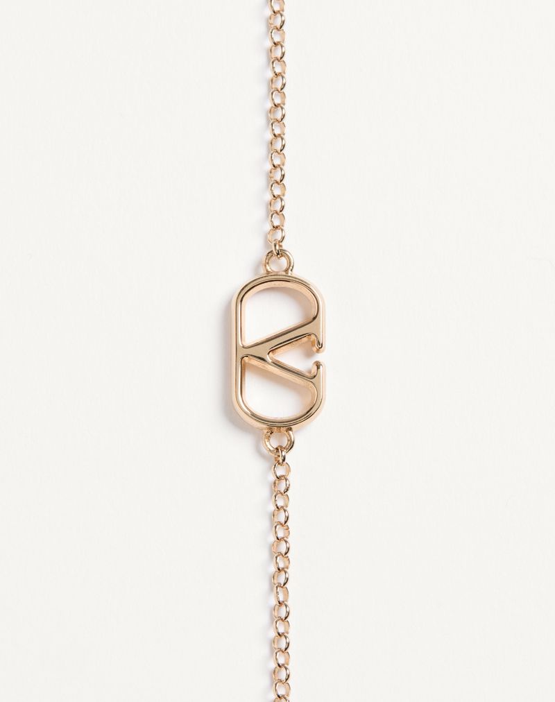 Pulseira de metal com assinatura VLogo