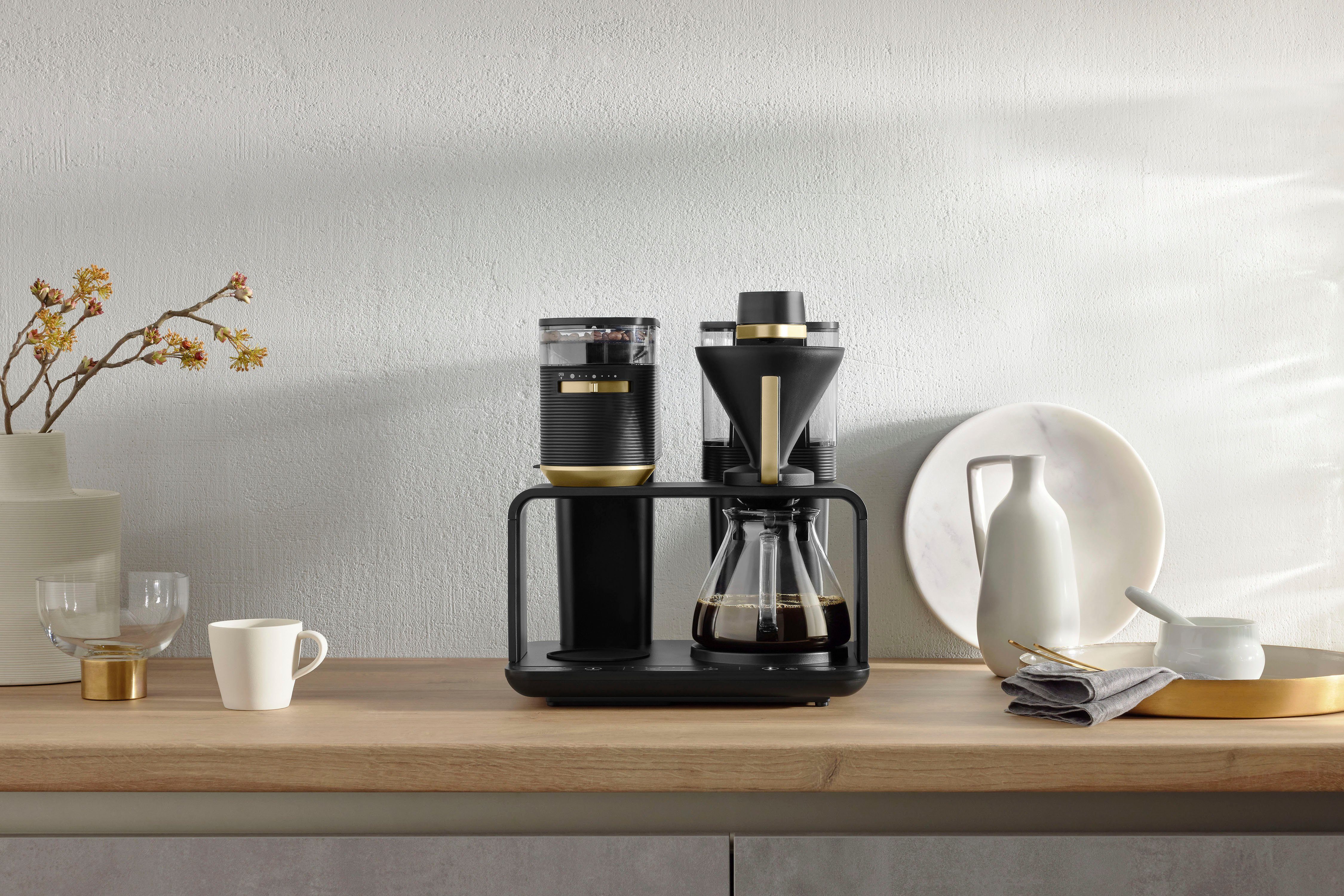 Melitta Kaffeemaschine mit Mahlwerk EPOS® 1024-04, 1l Kaffeekanne, Papierfilter 1x4, Schwarz/Gold, 360°rotierender Wasserauslauf