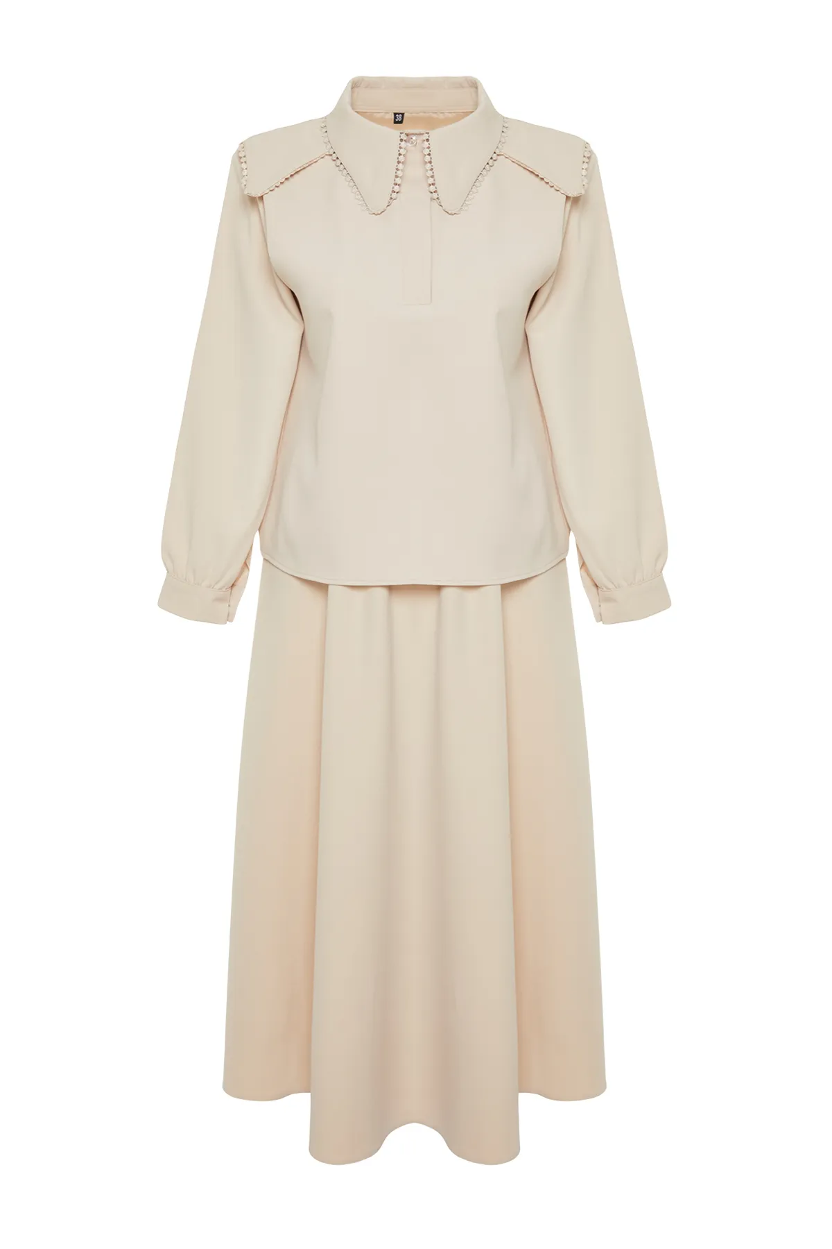 Trendyol Modest  Beiges Baby-Set aus Oberteil und Unterteil aus gewebtem Stoff mit Kragen, Rock und Tunika TCTSS24US00064