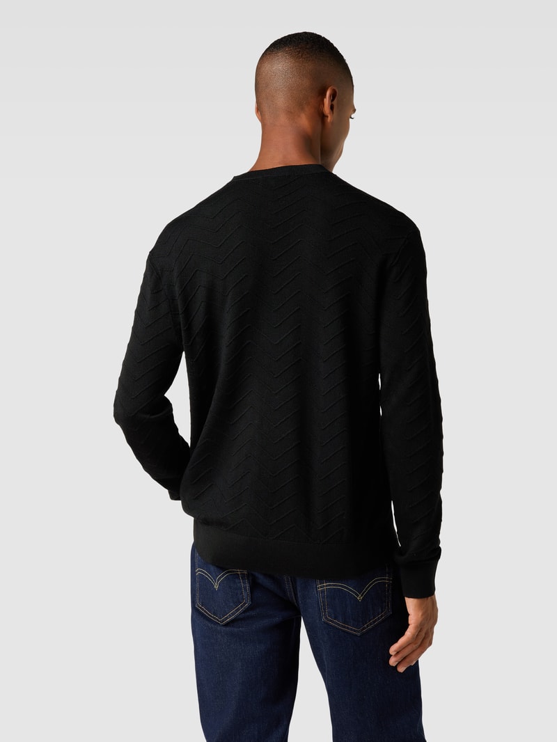Strickpullover aus Schurwolle-Mix mit Ziernähten in schwarz