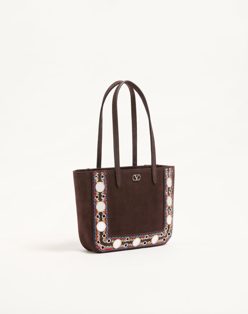 Bolsa de compras mini Valentino Garavani Nellcôte em camurça com detalhes bordados.
