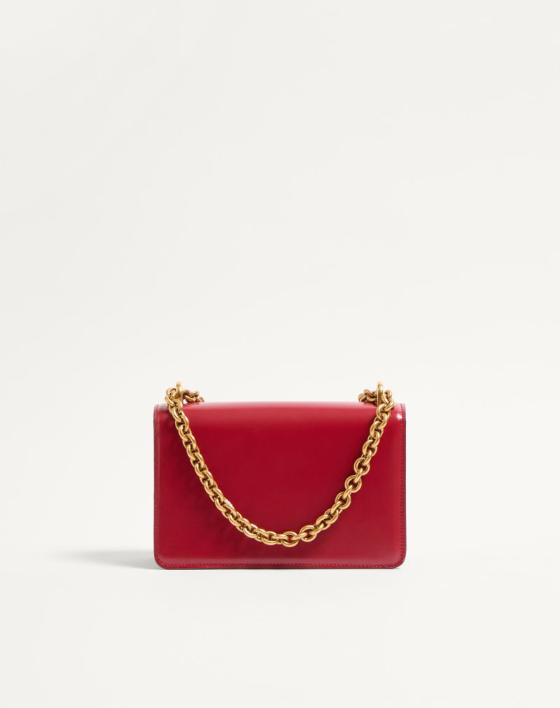 Bolsa de ombro pequena Valentino Garavani Vain em couro de bezerro brilhante