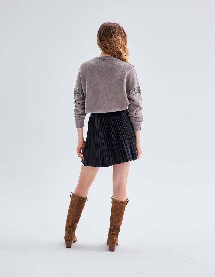 Jupe courte noire plissée recyclée esprit rock Femme