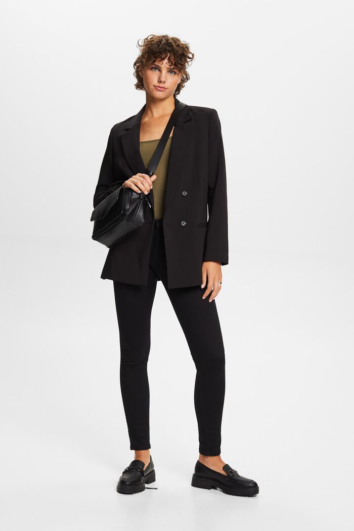 Recycelt: Skinny Stretchjeans mit mittelhohem Bund