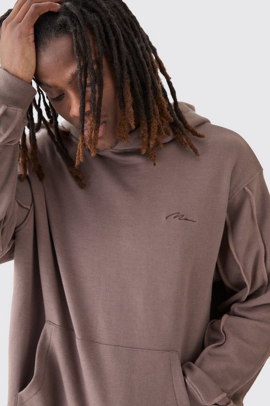 Oversize Hoodie mit rohem Saum und Man Signature Stickerei