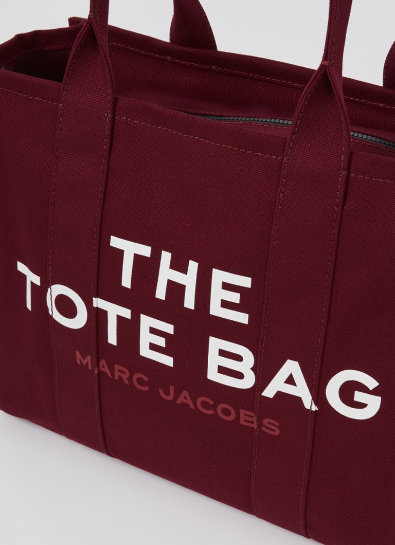 Geantă mare Marc Jacobs din pânză cu logo imprimat.