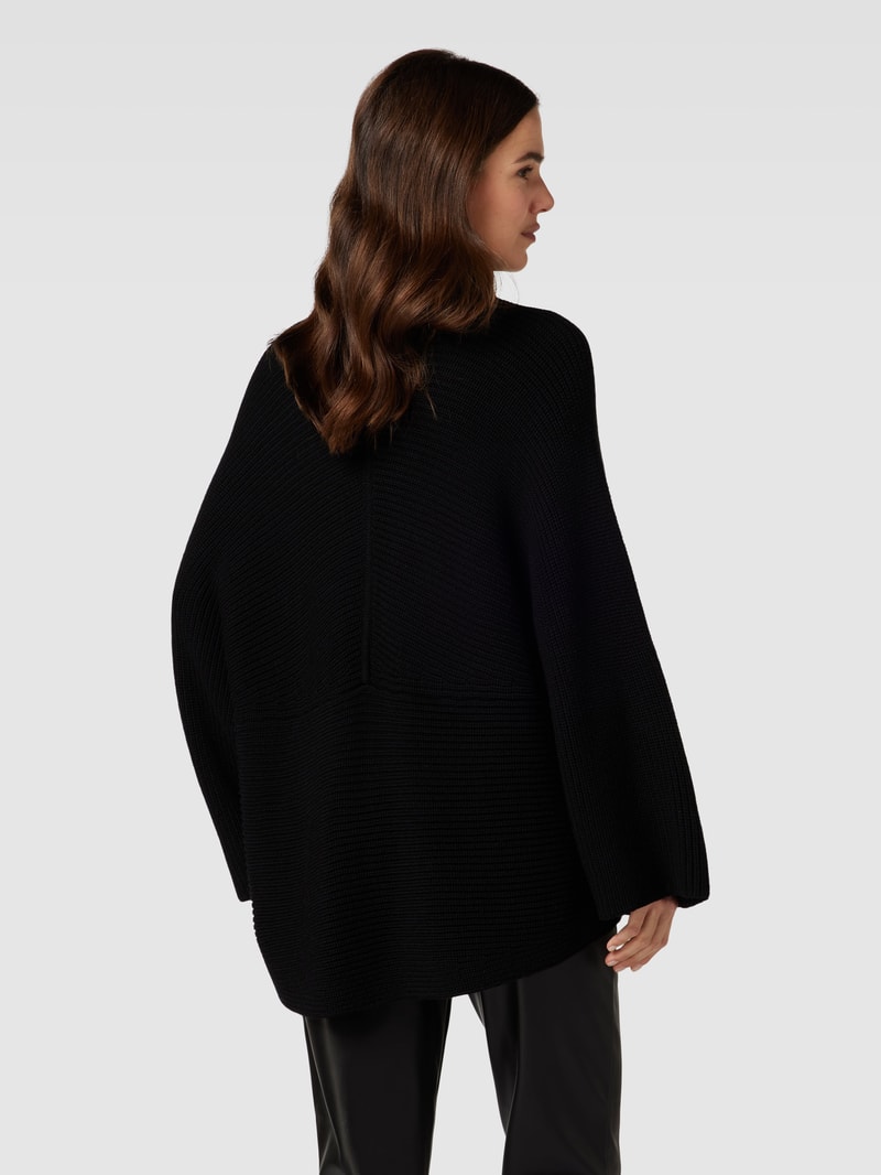 Oversized Strickjacke mit Lochmuster in schwarz