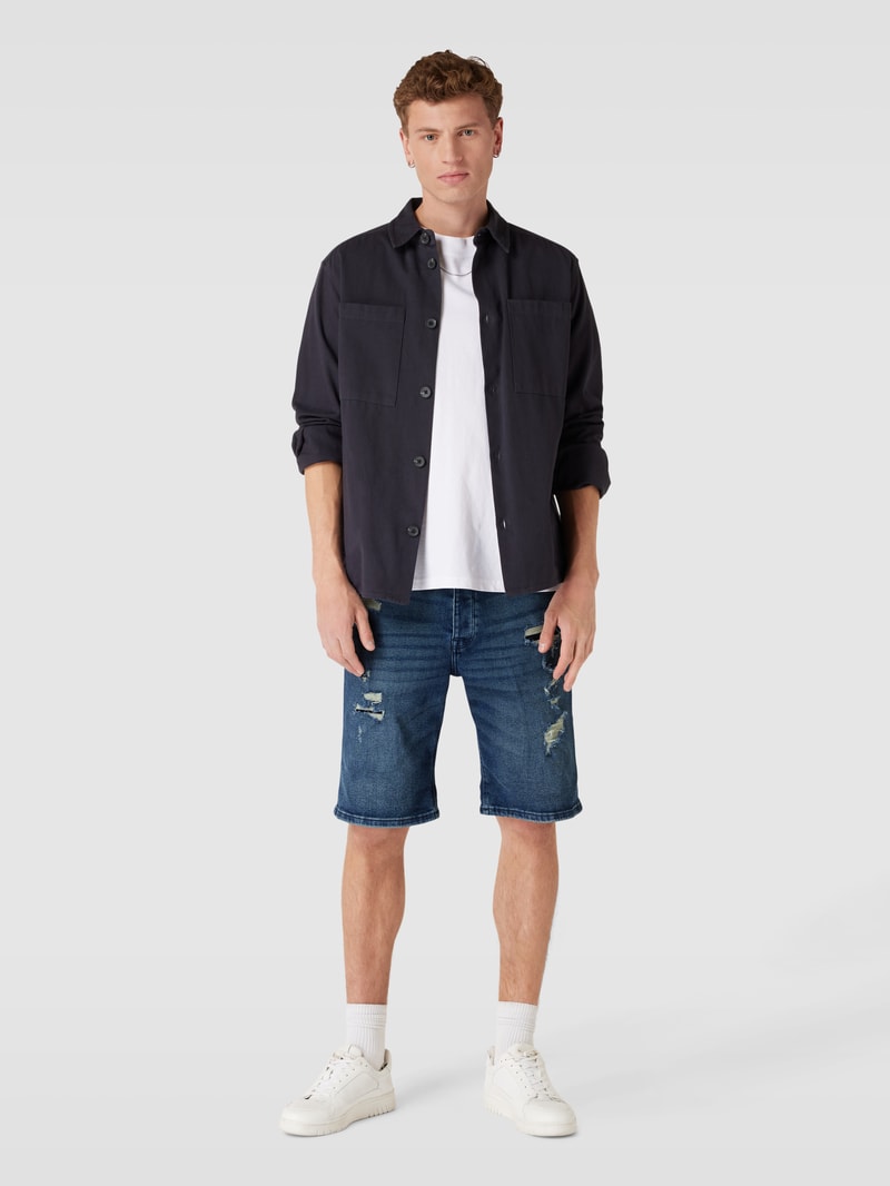 Jeansshorts im Destroyed-Look in dunkelblau