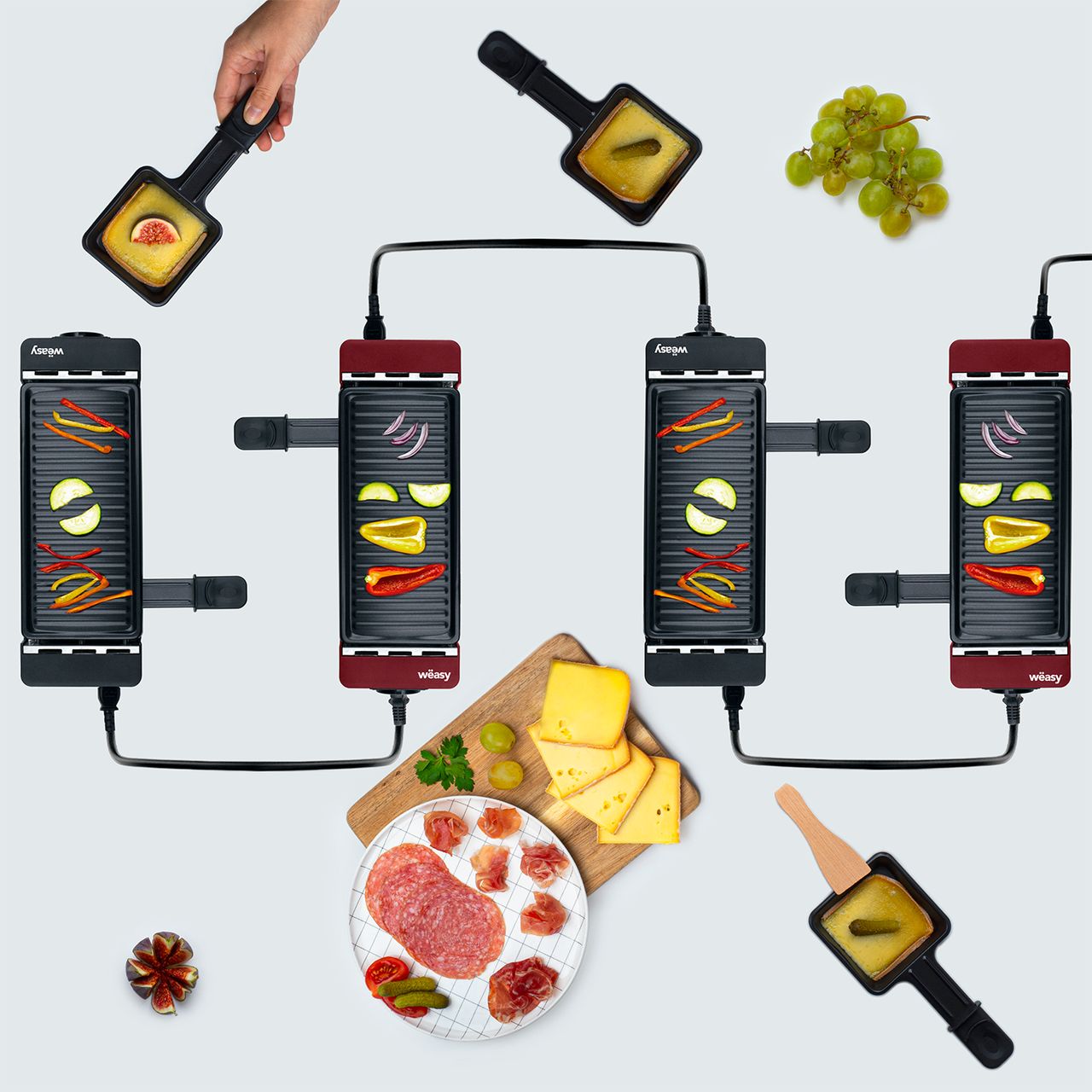 Weasy Wëasy Raclette TIK12 / 2 Personen / Raclette und Grill / Antihaftbeschichtung / verbindbar mit TAK12 und bis zu 4 Geräten / 2 Pfannen und 2 Holzspatel / 400 W / schwarz