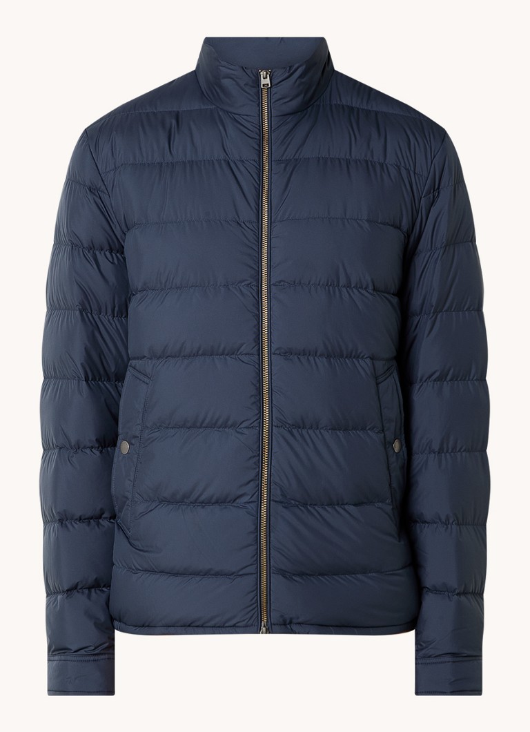 Jachetă matlasată din microfibră Woolrich, umplută cu puf și prevăzută cu buzunare laterale.