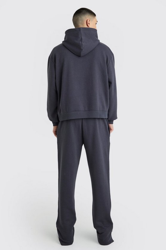 Kastiger Oversize Official Trainingsanzug mit geteiltem Saum