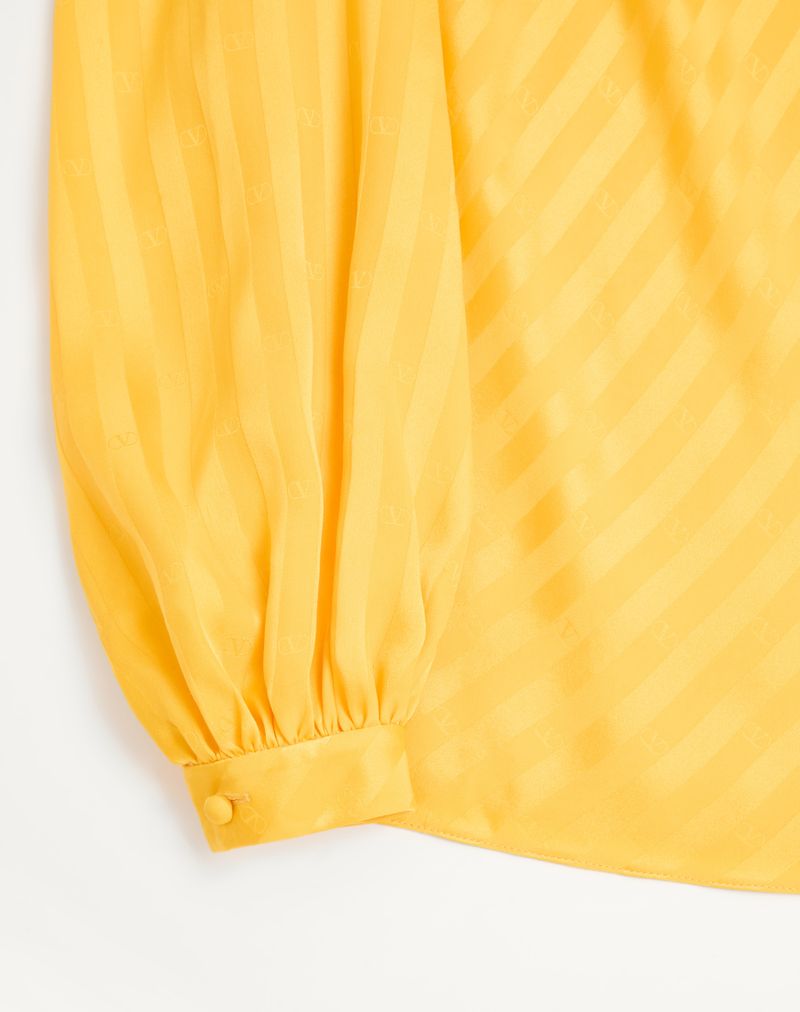 Blusa de jacquard listrada com logo em V