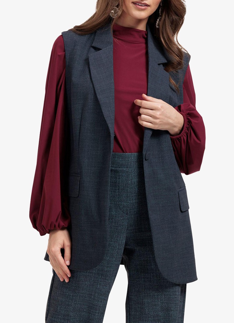 Studio Anneloes Minte veste ar atlokāmām kabatām