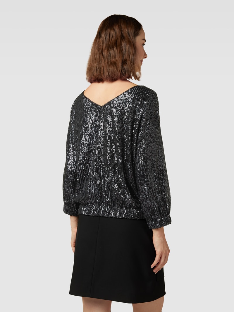 Bluse mit Paillettenbesatz in schwarz