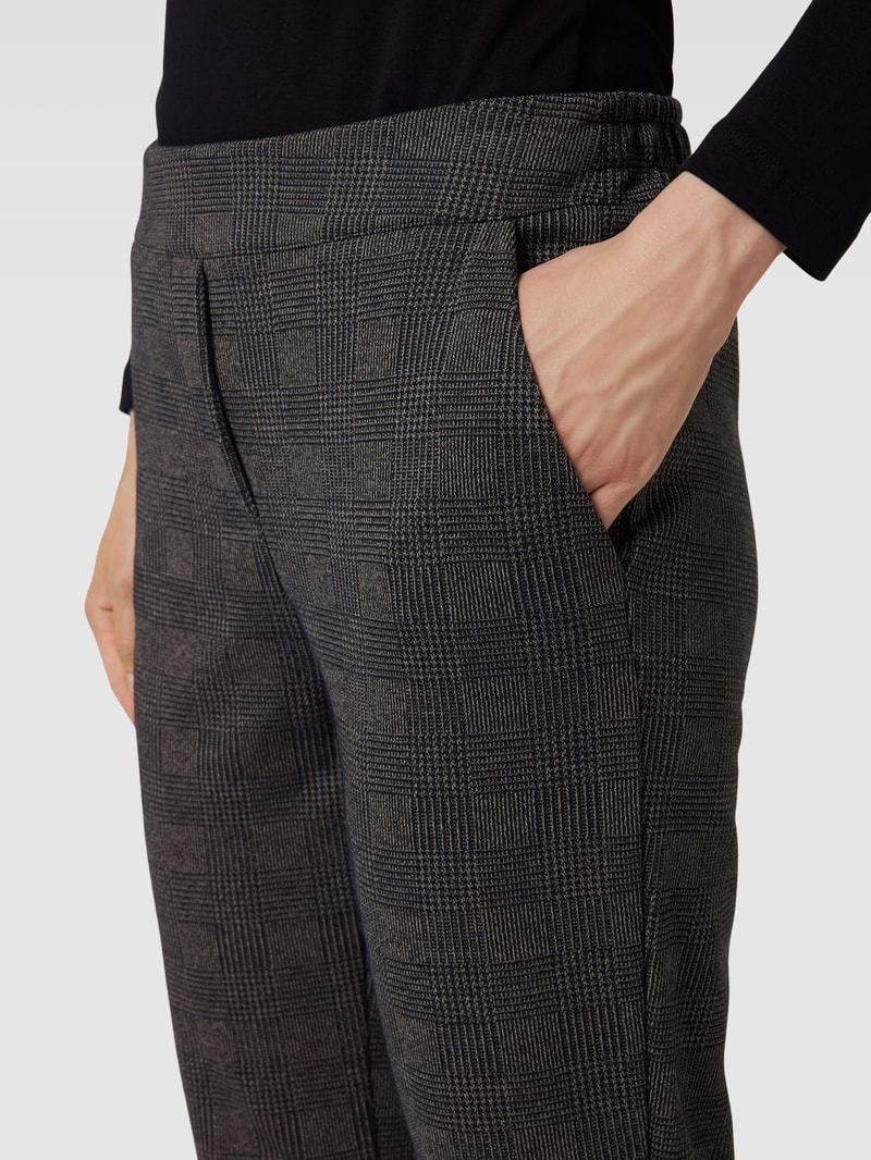 Stoffhose mit Allover-Muster in schwarz