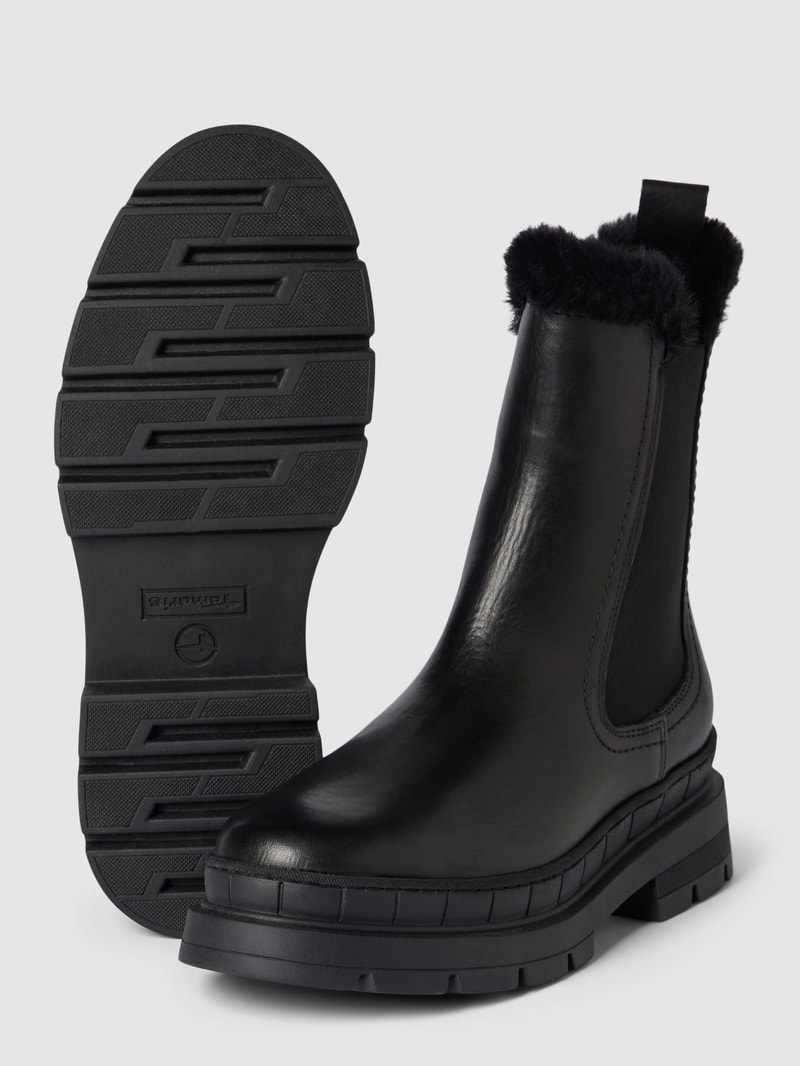 Chelsea Boots aus Leder mit Kunstfellbesatz in schwarz