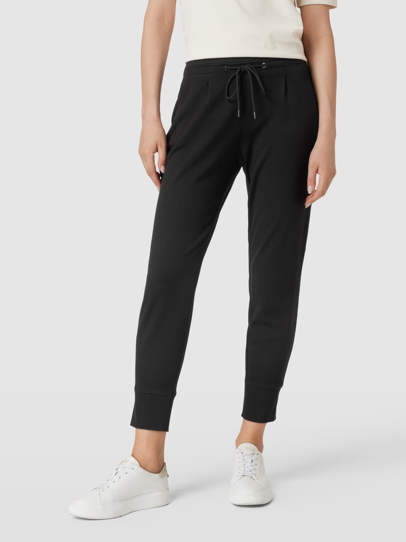 Stoffhose mit elastischem Bund in schwarz