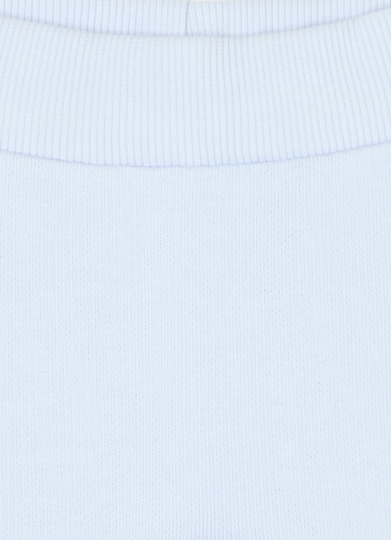 Pantaloni de trening Benetton cu croială conică și broderie.