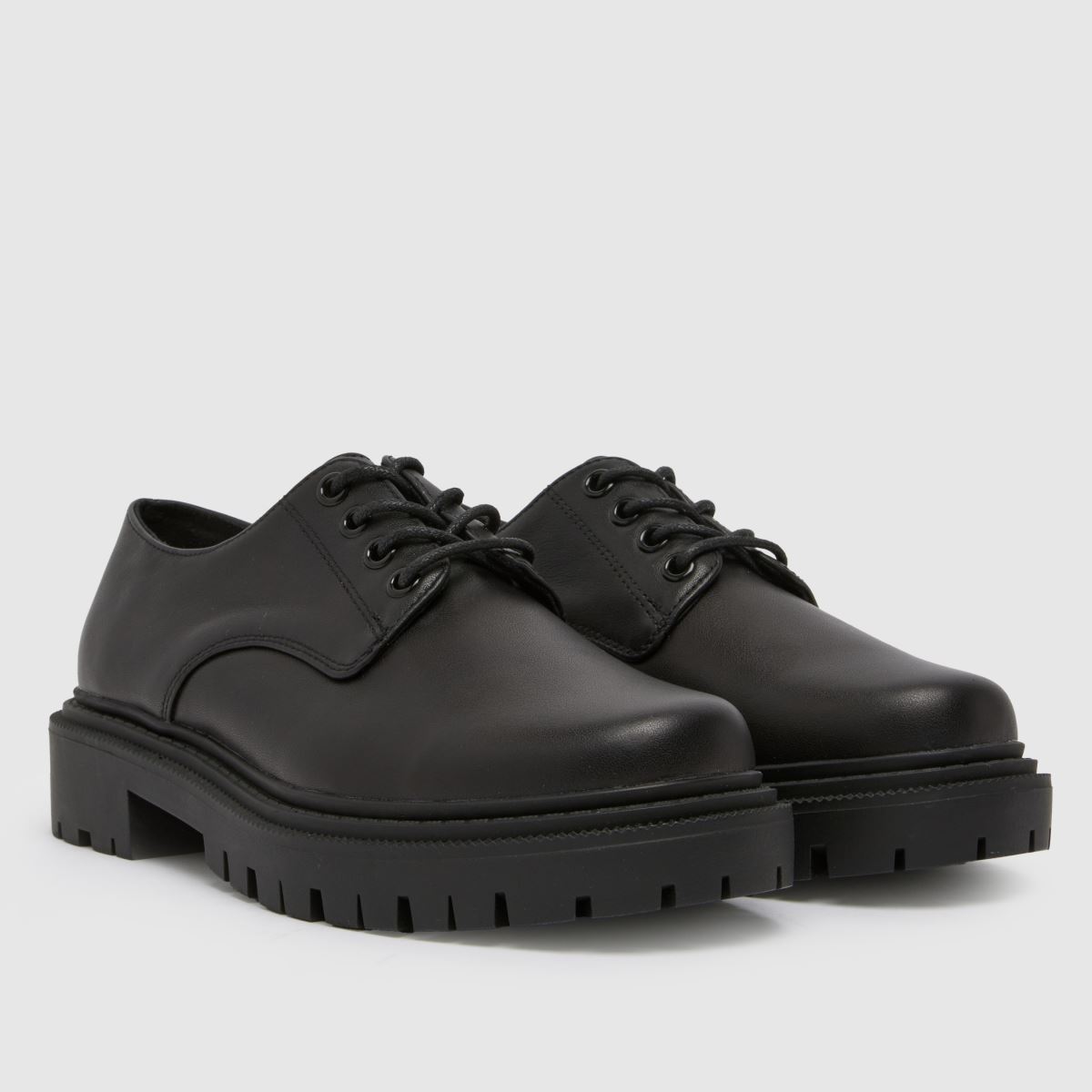 Schuh – Wide Fit – Leonora – Svarta platta skor i läder med snörning
