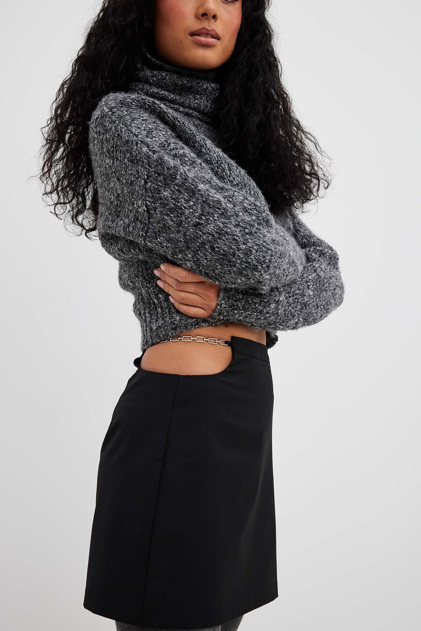 Rock mit Cut-outs und Metalldetail