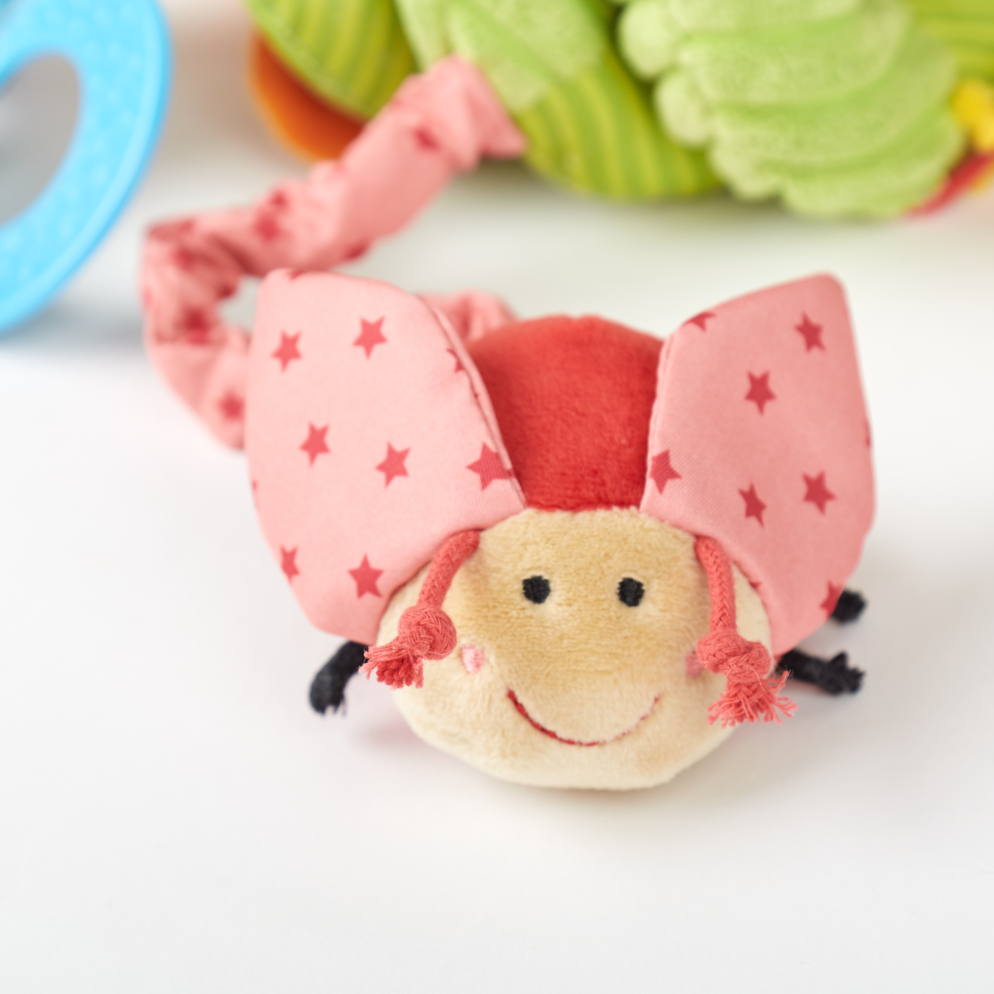 Babyschalenspielzeug Schmetterling