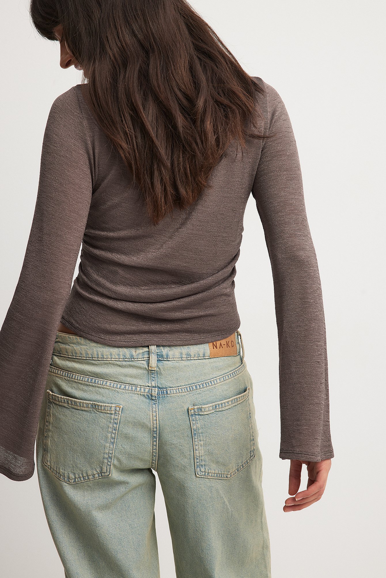 Top mit Knopfdetail
