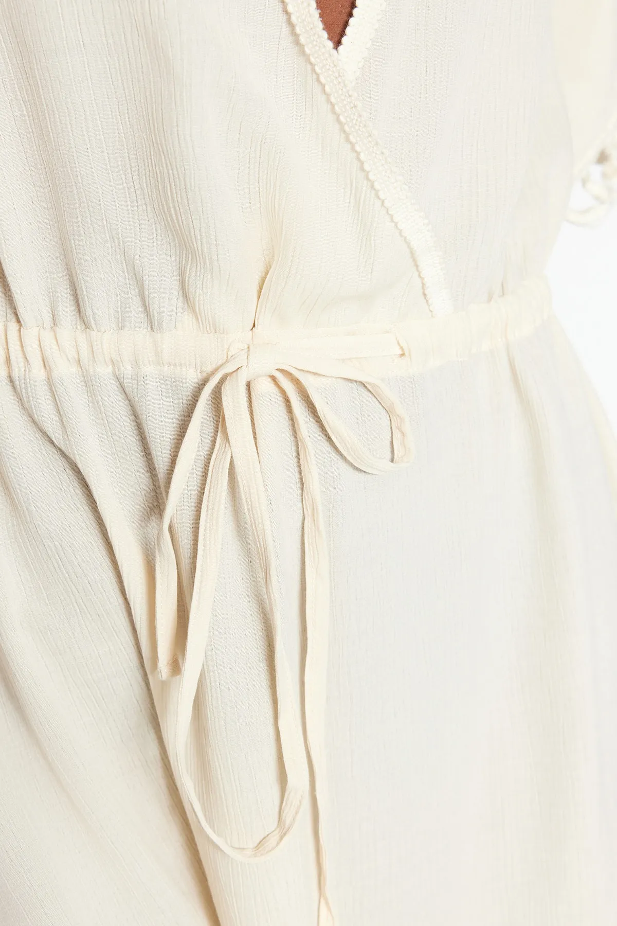 Trendyol Collection  Beiges Maxi-Strandkleid mit gewebten Quasten TBESS22EL0842
