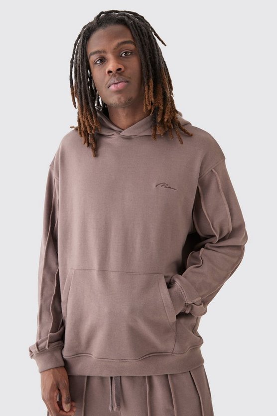 Oversize Hoodie mit rohem Saum und Man Signature Stickerei