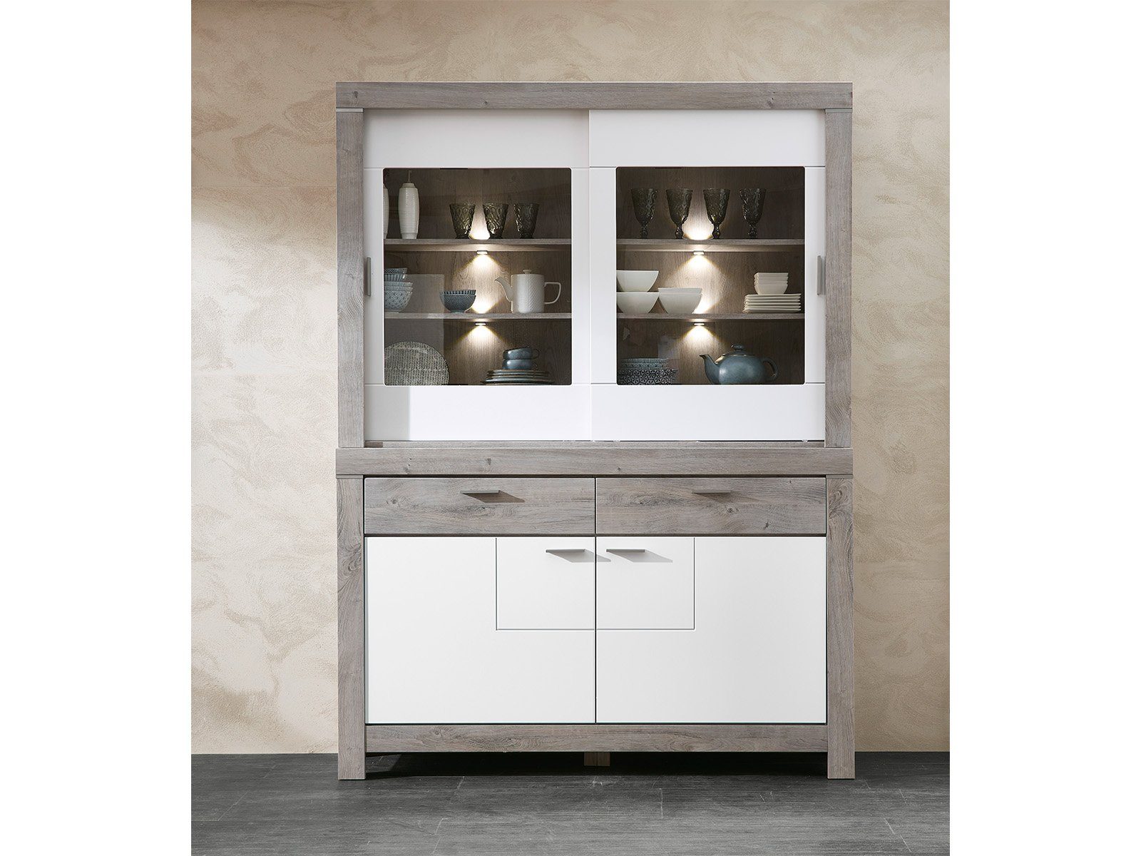 möbelando Buffet Gravesend Modernes Buffet in Haveleiche Nachbildung / Lack Laminat Weiß supermatt, Korpus aus Spanplatte, Front aus MDF bestehend aus 1 Sideboard und 1 Buffet-Aufsatz, inkl. LED-Beleuchtung. Breite 156 cm, Höhe 211 cm, Tiefe 42 cm