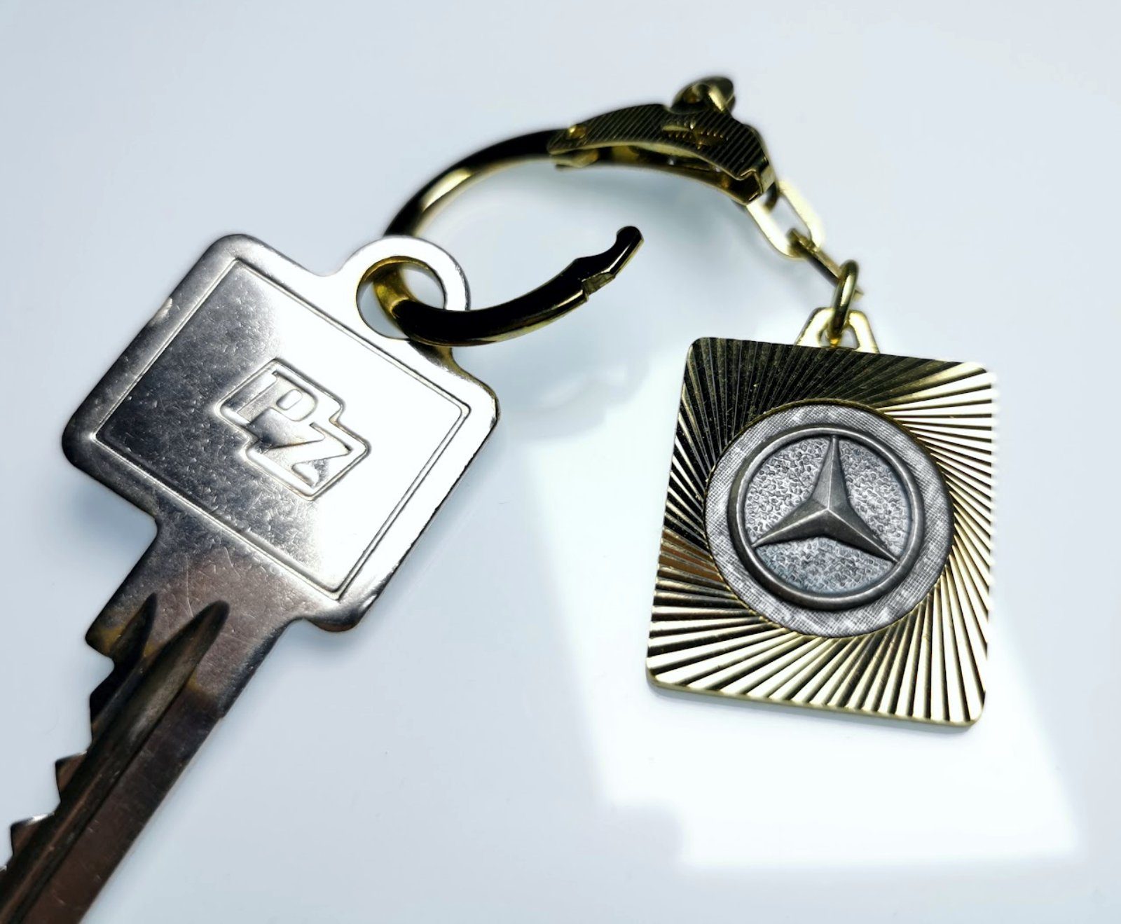 HR Autocomfort Schlüsselanhänger Orig. historisch 1962 Metall Stern Lüfterrad Diamantschliff Plakette