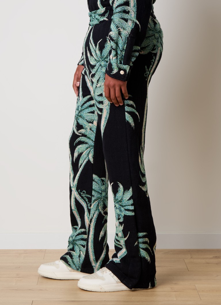 AMIRI Flared trousers with tropical print
