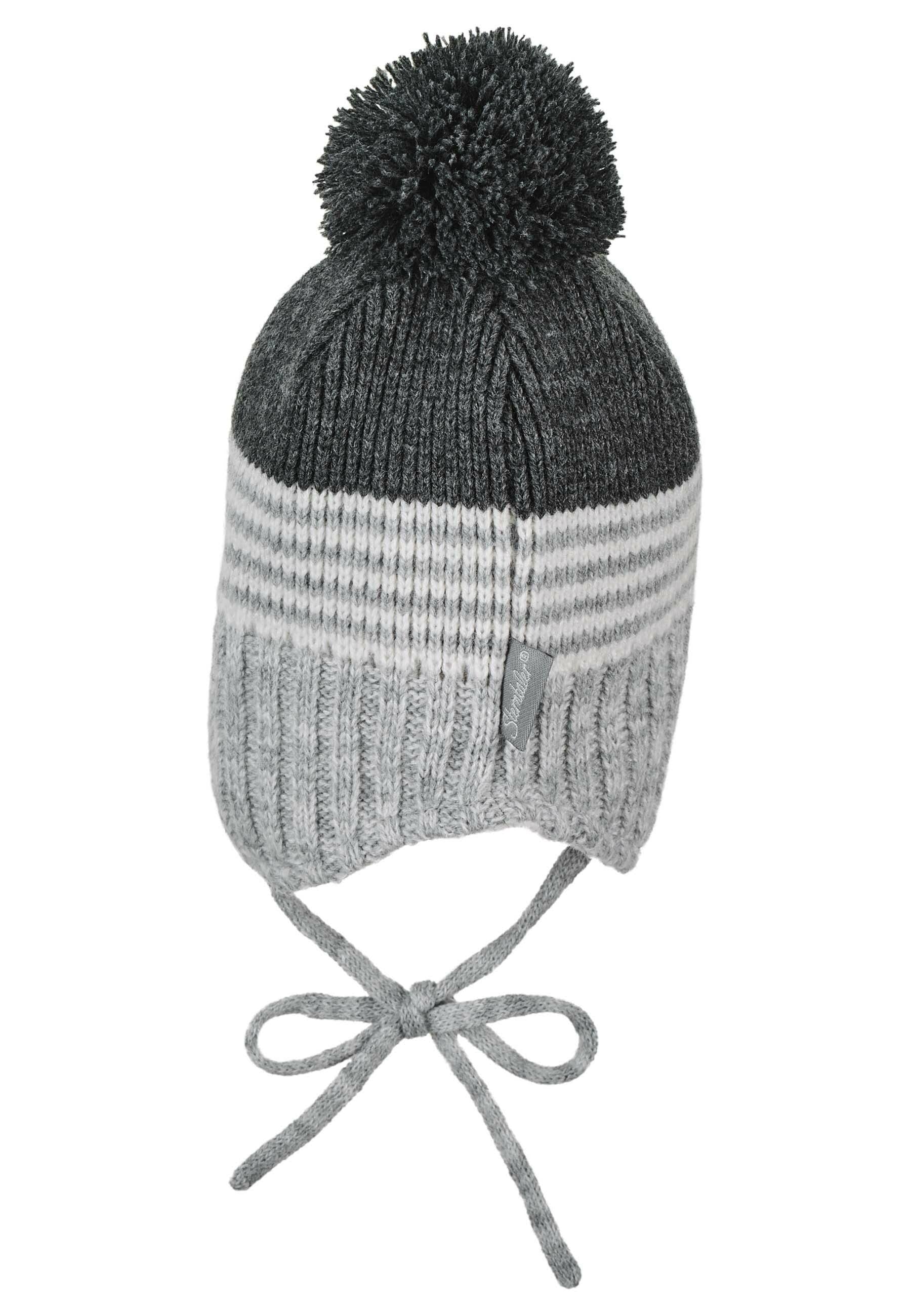 Strickmütze im Mustermix mit Bommel und Bindeband
