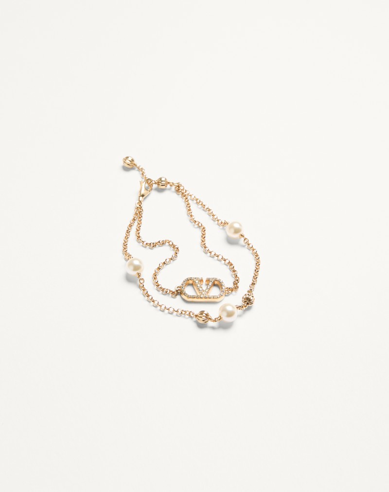 Pulseira exclusiva VLogo em metal, pérolas AE Cristais Swarovski®