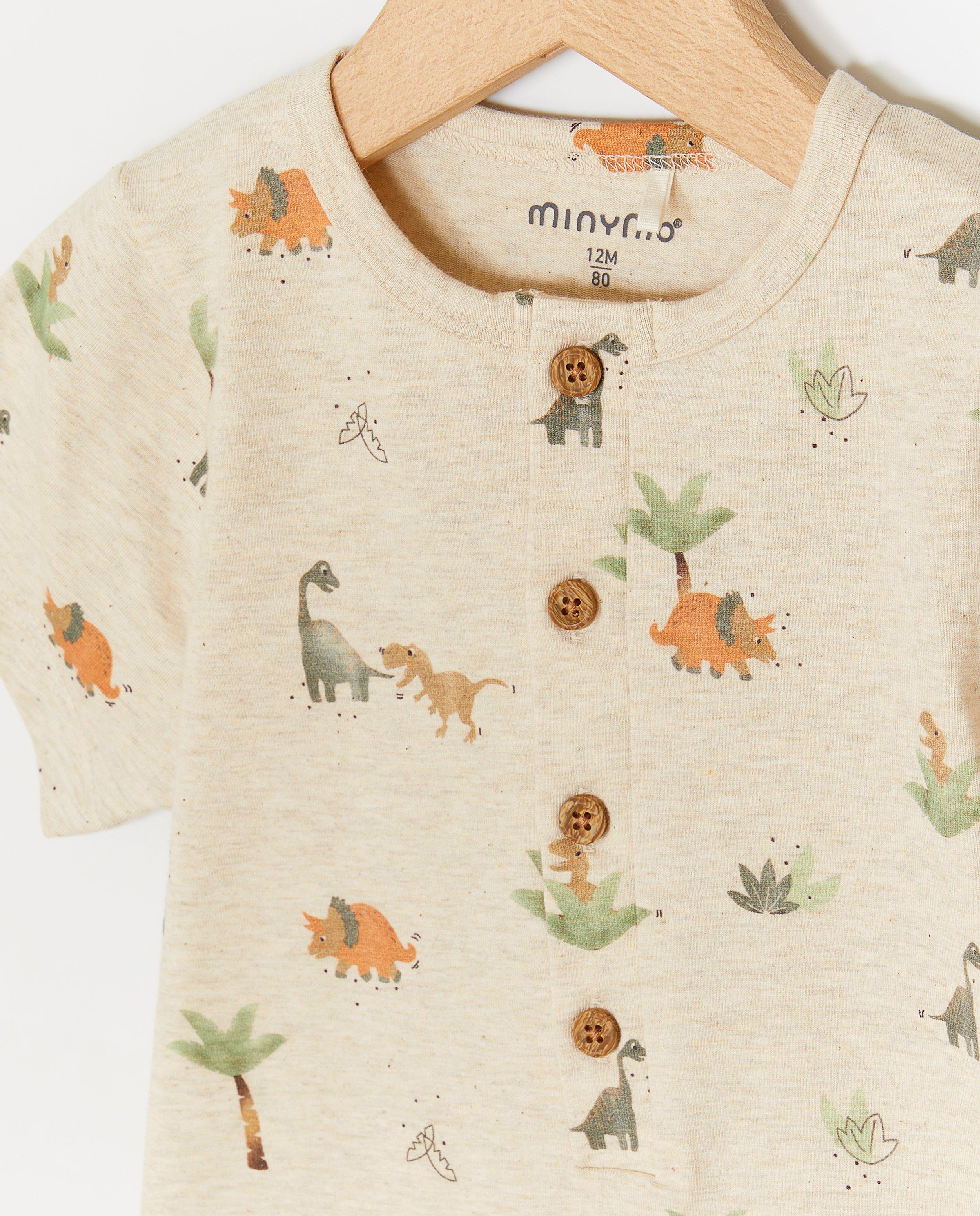 Minymo sparkdräkt med dinosaurietryck ljusbeige